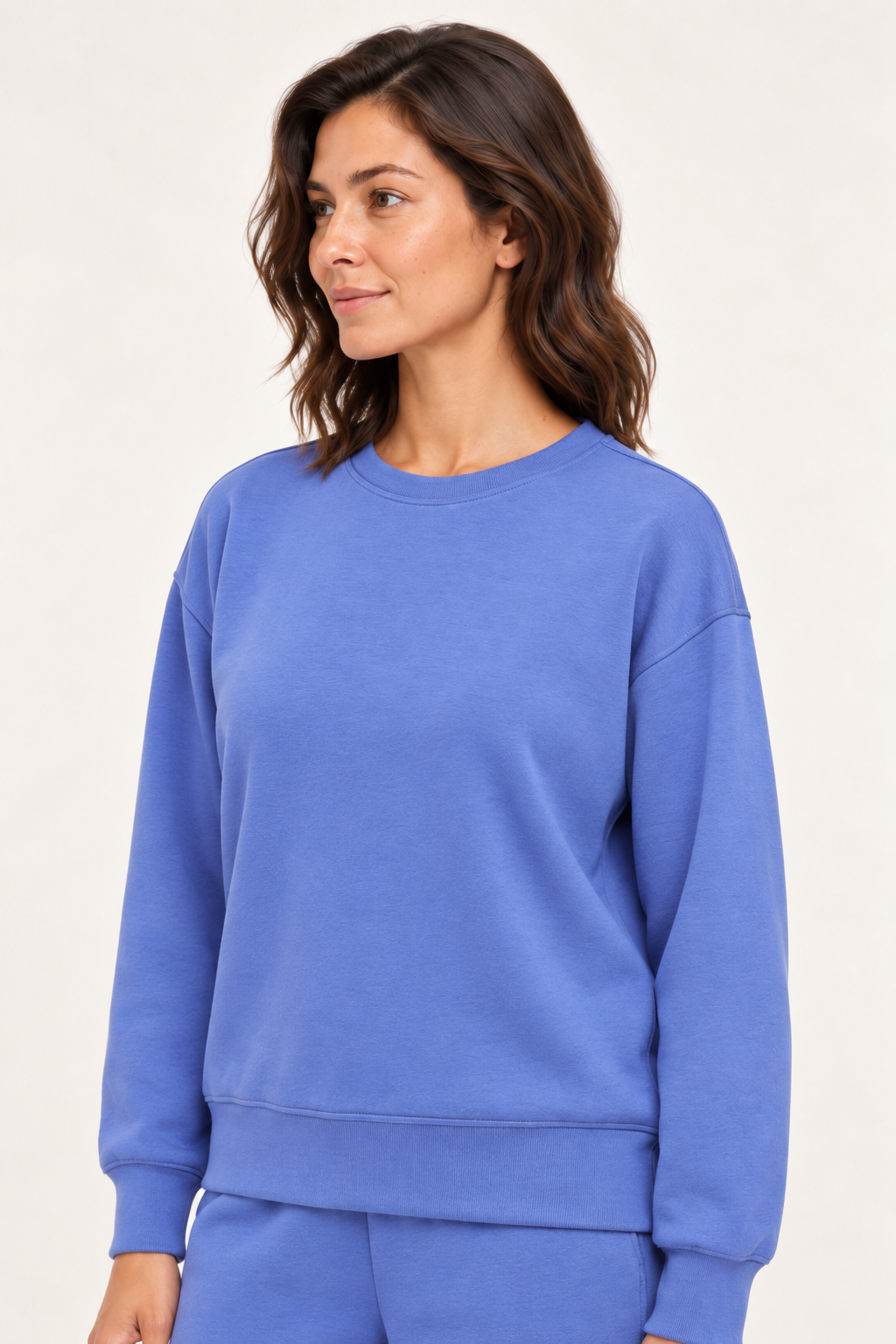 Close-up of the blue Lana Pullover crewneck, dropped shoulders and ribbed hem